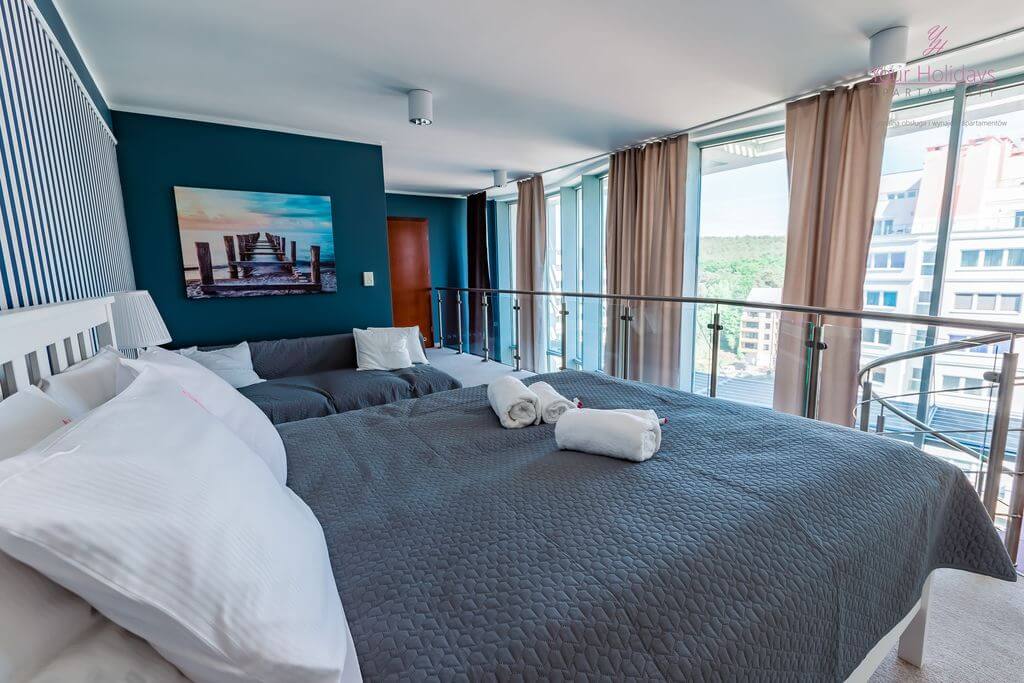 Międzyzdroje Apartament Promenada Gwiazd 28/1001 - sypialnia na piętrze w apartamencie blisko morza